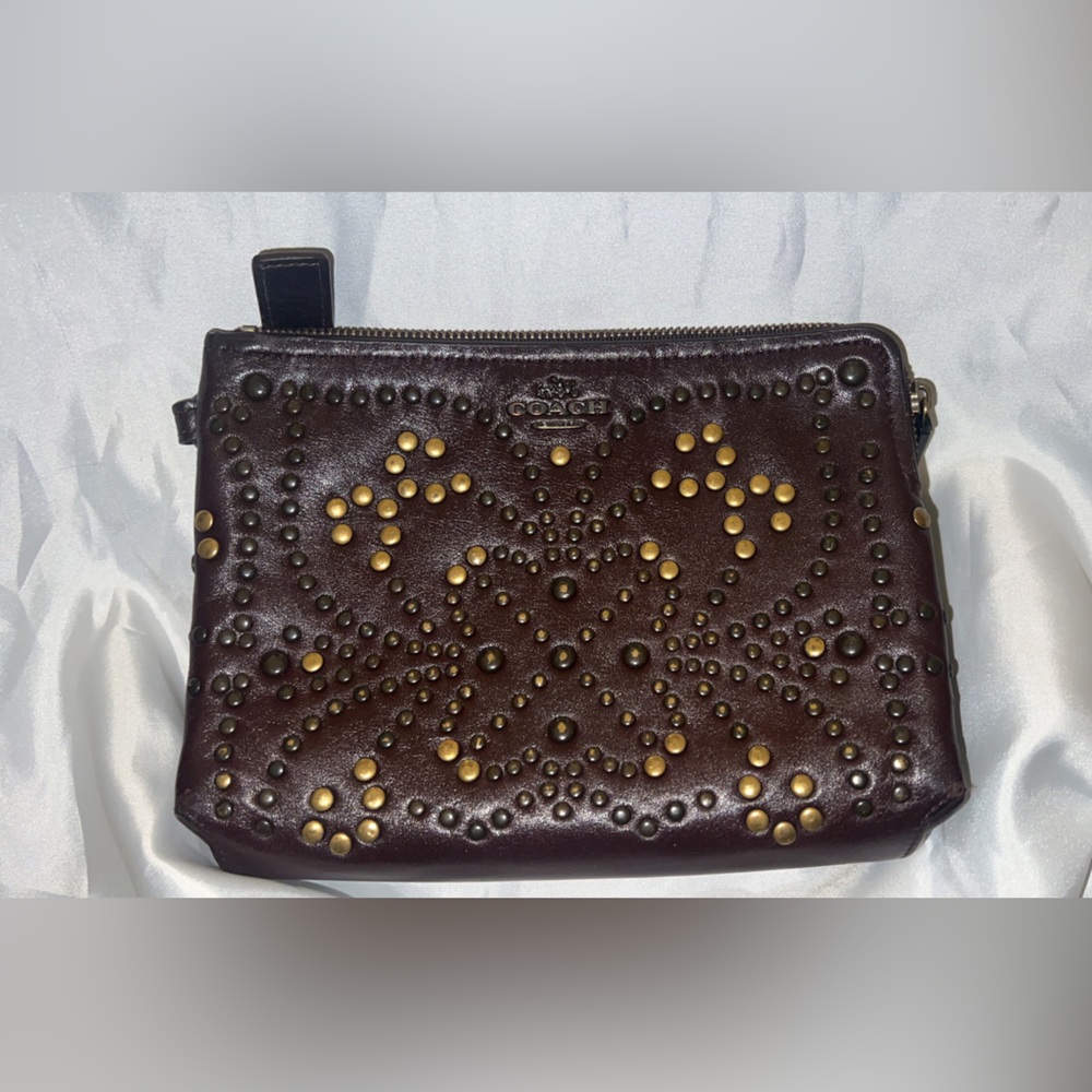 Coach oxblood studded wristlet